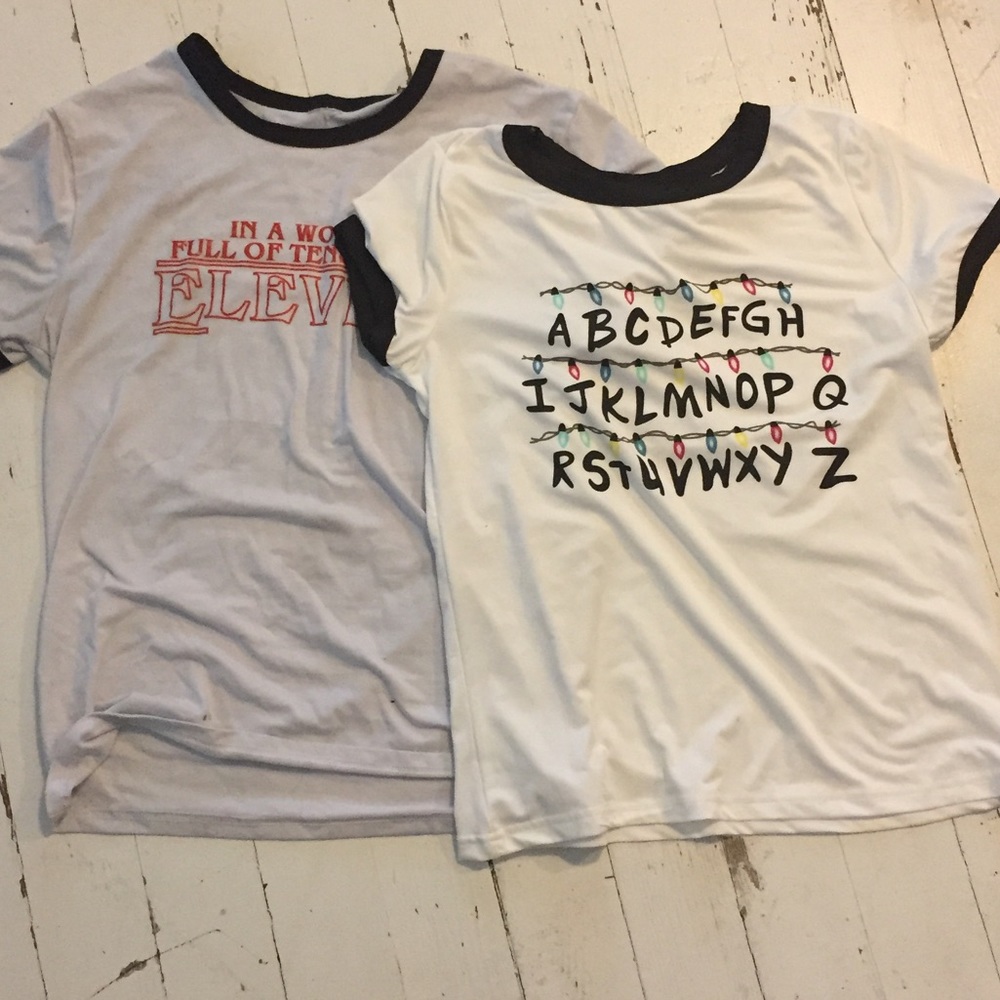 Two stranger things shirts
